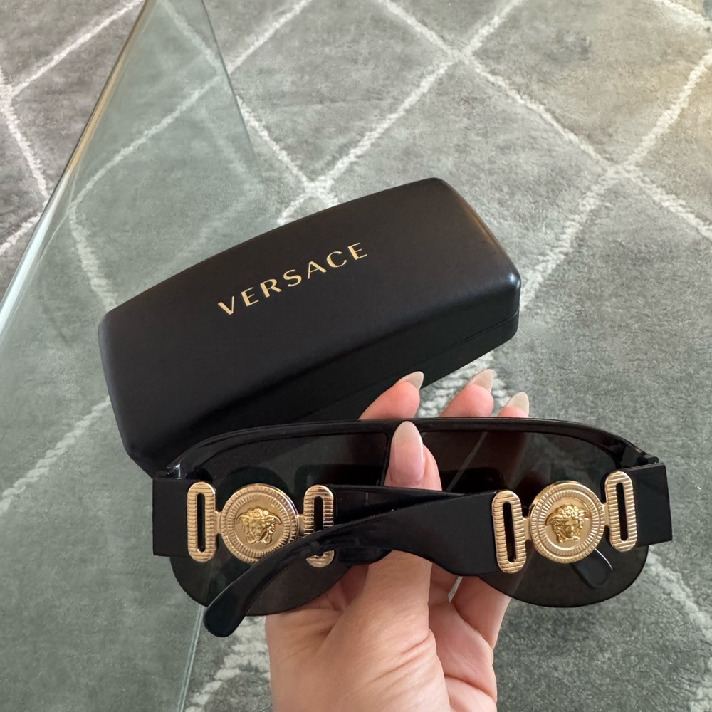 Versace Women's Sunglasses with Black Frame and Gold Medallions